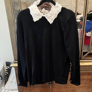 Chic Black Sweater with White Floral Collar